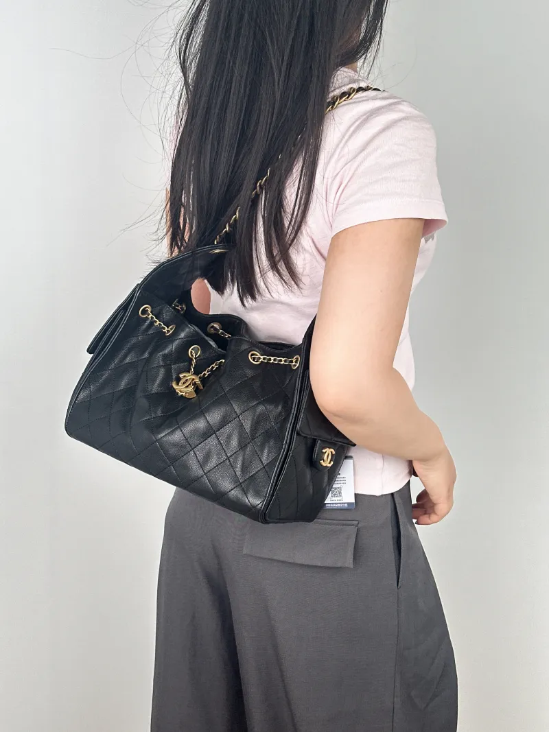 Chanel Shoulder Bag25Bag Black Grained Calfskin Small26 × 14 × 30 cm — on-model view 2 of 2