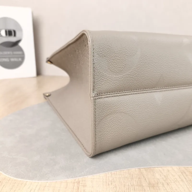 Louis Vuitton Shoulder Bag Onthego Medium Monogram Empreinte Embossed Calfskin Medium 35 × 14 × 27 cm — detail view 8 of 11