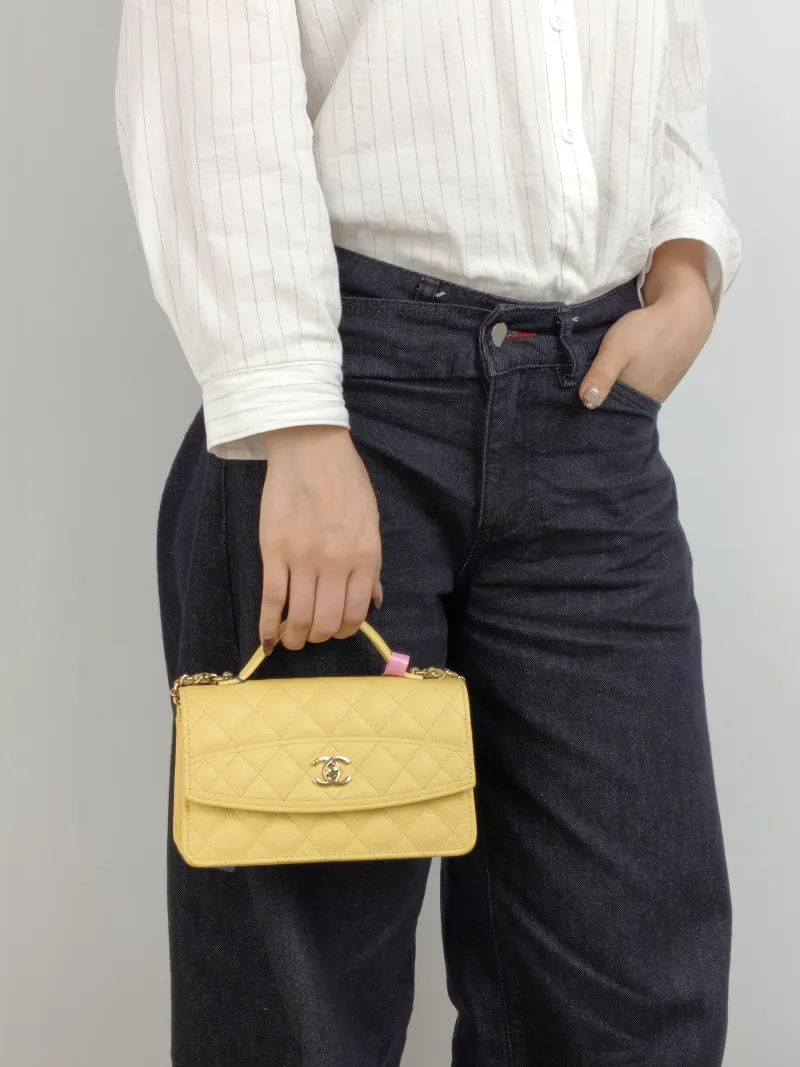 Chanel Crossbody Bag Yellow Grained Calfskin One Size 19 × 7 × 11.5 cm — on-model view 2 of 3
