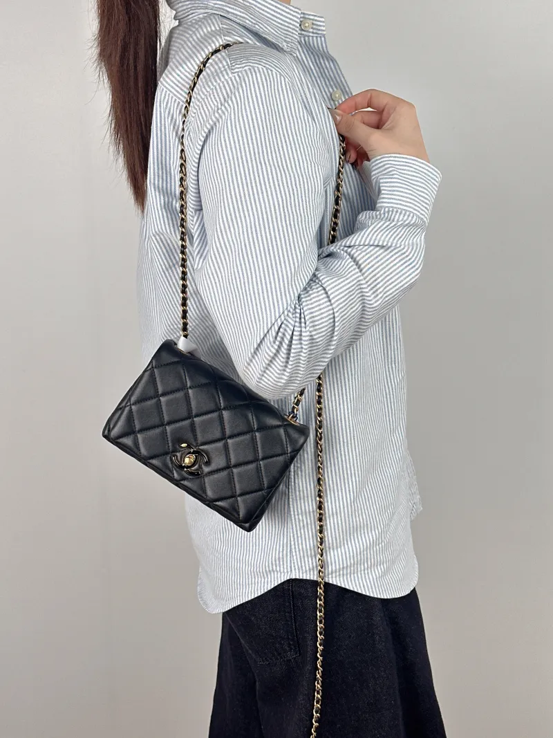 Chanel Crossbody Bag C Edition Black Lambskin Mini 18 × 7 × 12 cm — on-model view 2 of 2