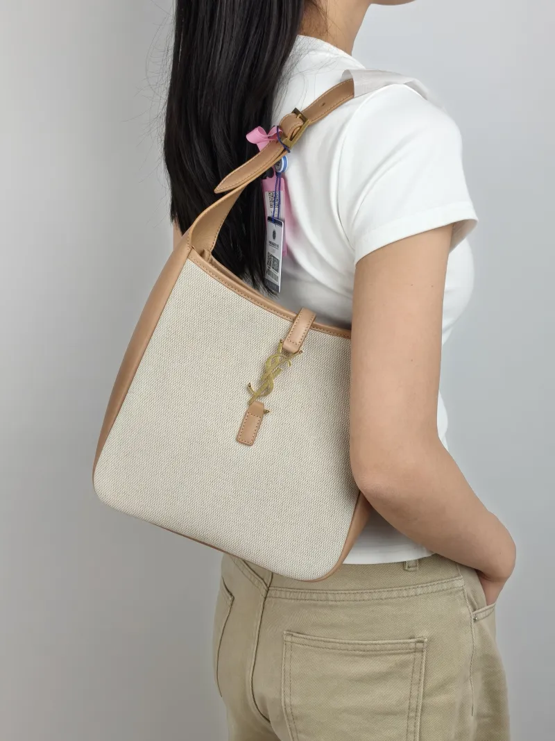 SAINT LAURENT Crossbody Bag LE 5 À 7 Hobo Inner Pouch Beige Brown Canvas Small 22.5 × 8.5 × 23 cm — on-model view 1 of 2