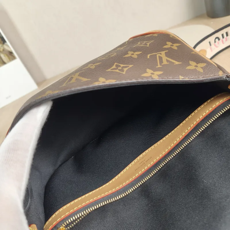 Louis Vuitton Crossbody Bag Diane Baguette Bag Shoulder Strap PVC Small 24 × 9 × 15 cm — detail view 8 of 13