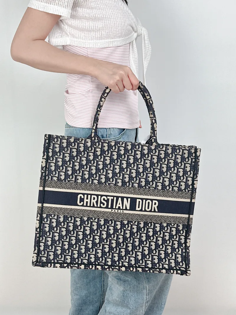 DIOR Top Handle Bag Book Tote Blue Canvas Large42 × 18.5 × 35 cm — on-model view 1 of 2