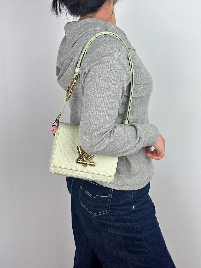 Louis Vuitton Crossbody Bag Twist Green Calfskin Small 19 × 9 × 15 cm — on-model view 1 of 2
