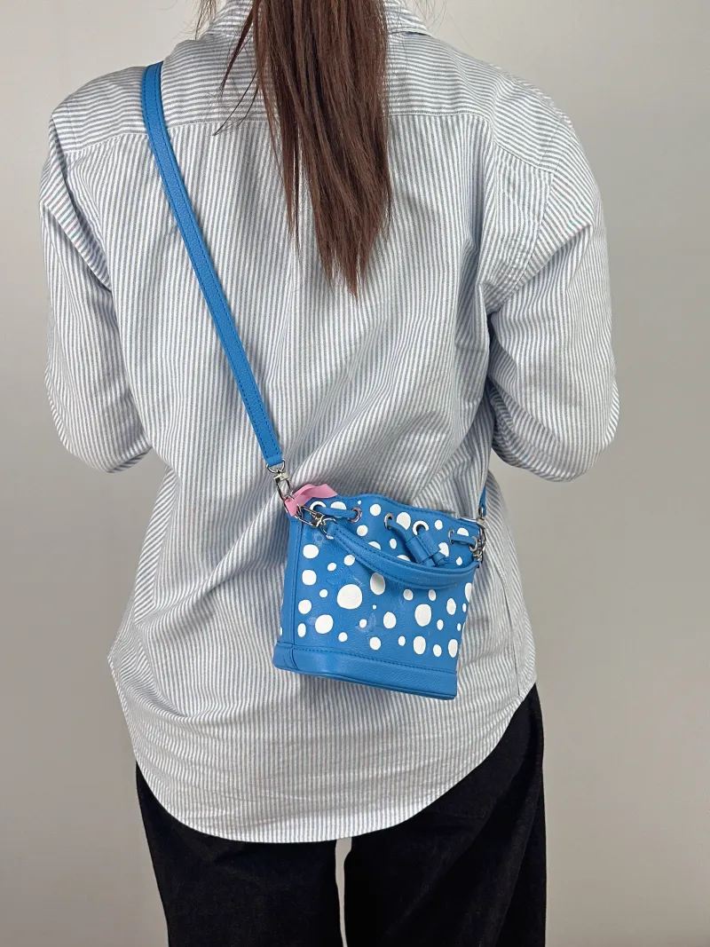 Louis Vuitton Shoulder Bag NANO NOÉ Bucket Bag Nano - Calfskin nano 13 × 10 × 16 cm — on-model view 3 of 3