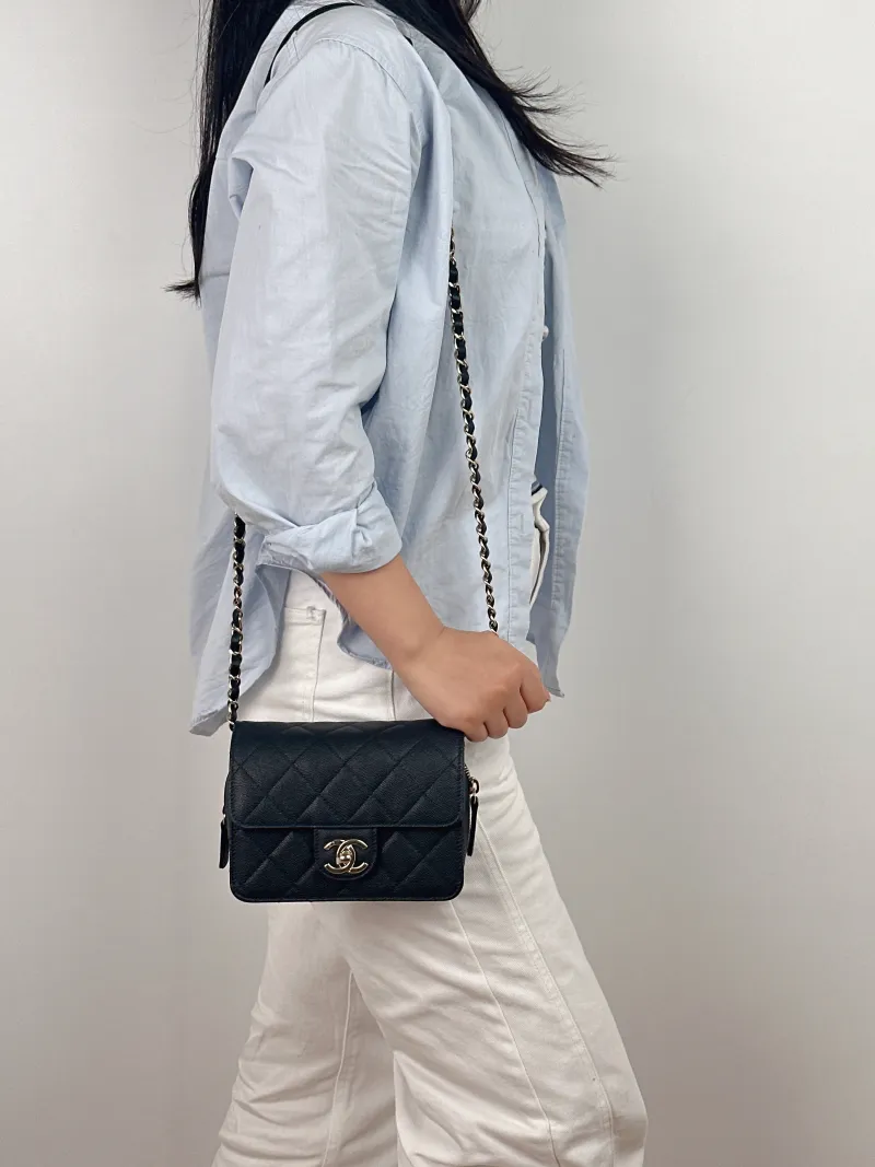 Chanel Crossbody Bag Edition Black Grained Calfskin 18 × 6 × 13.5 cm Microchip Edition — on-model view 2 of 2
