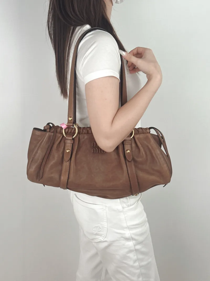 Miumiu Shoulder Bag Joie Shoulder Bag Lambskin One Size44 × 10.5 × 21 cm — on-model view 1 of 2