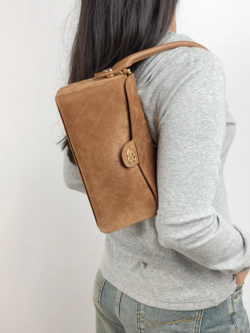 Chanel Shoulder Bag Baguette Bag Brown Suede One Size 23 × 11 × 11 cm — on-model view 3 of 3