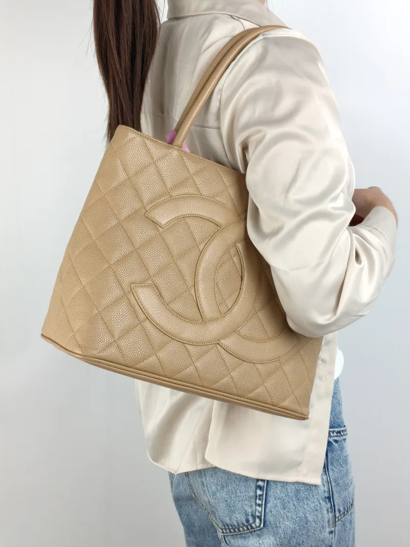 Chanel Top Handle Bag Medallion Taupe Grained Calfskin Large 30 × 15 × 24 cm 7 — on-model view 1 of 2