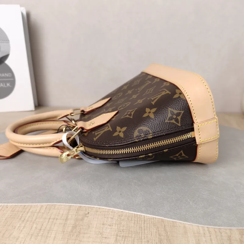 Louis Vuitton Crossbody Bag Alma BB Monogram PVC BB 23.5 × 11.5 × 17.5 cm — detail view 8 of 12
