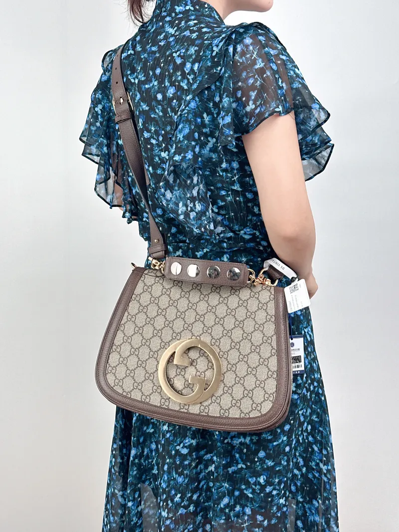 GUCCI Shoulder Bag Blondie Top Handle Bag Monogram PVC Medium29 × 7 × 22 cm — on-model view 1 of 2