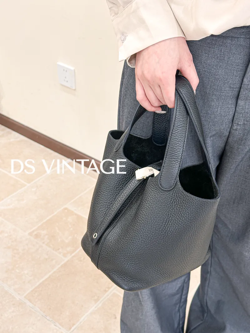 Hermès Top Handle Bag Picotin Lock 18 18Black Clemence Taurillon TC Calfskin Small18 × 13 × 19 cm — on-model view 2 of 3