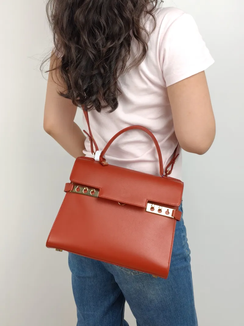DELVAUX Crossbody Bag Tempete Top Handle Bag Red Calfskin Medium 27.5 × 9 × 23 cm — on-model view 3 of 3