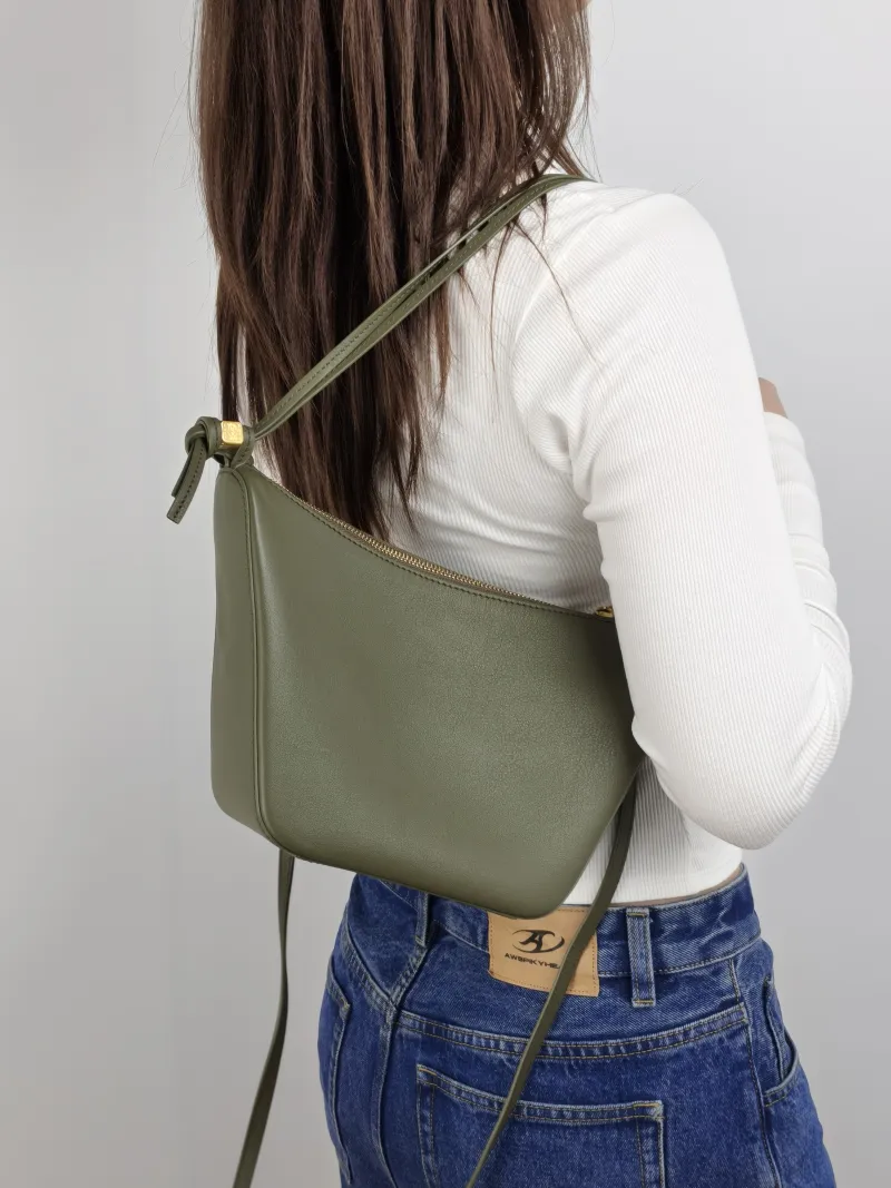 LOEWE Shoulder Bag Hammock hobo Green Calfskin Mini 28 × 9.5 × 17 cm — on-model view 2 of 2