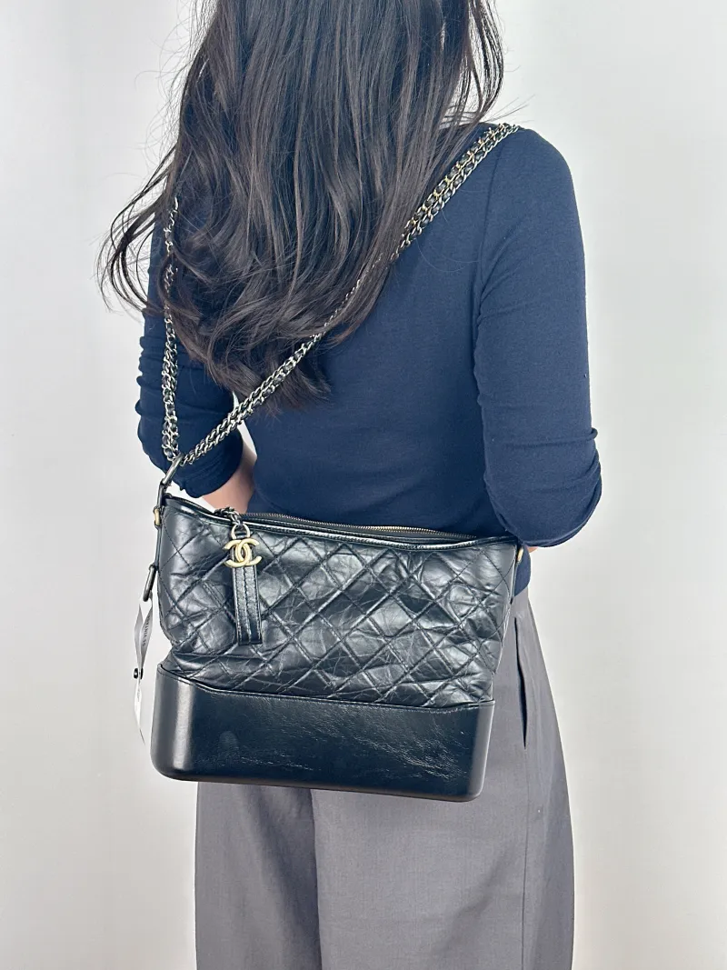 Chanel Crossbody Bag Gabrielle Gabrielle Bag Black CC alfskin Large28 × 10 × 23 cm — on-model view 2 of 2