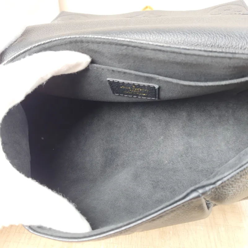 Louis Vuitton Crossbody Bag Favorite Black Monogram Empreinte Embossed Calfskin Medium 24 × 9 × 14 cm — detail view 9 of 12