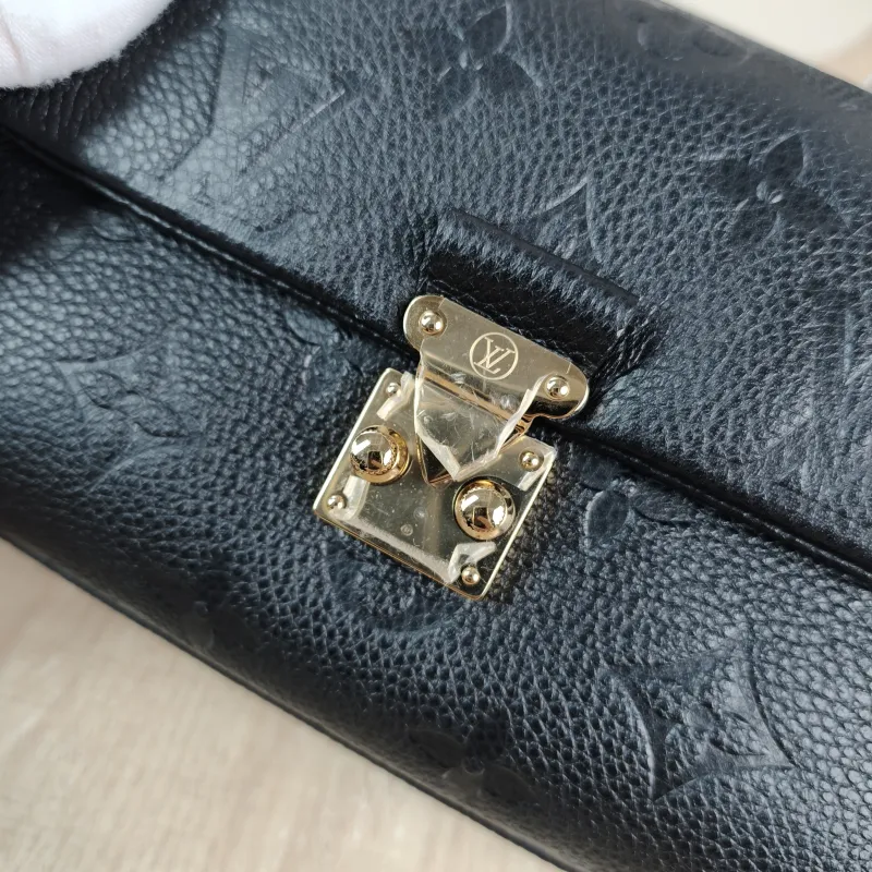 Louis Vuitton Crossbody Bag MADELEINE Black Monogram Empreinte Embossed Calfskin nano 21 × 6 × 12.5 cm — detail view 8 of 14