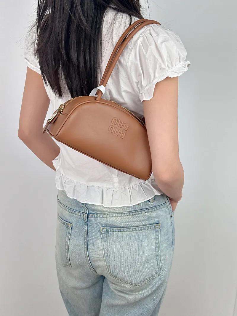 Miumiu Shoulder Bag Beau Brown Calfskin Small 23 × 10 × 11.5 cm — on-model view 1 of 2