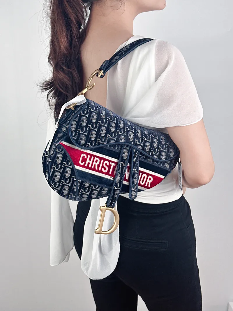 DIOR Top Handle Bag Saddle Blue Canvas Medium25.5 × 6.5 × 20 cm — on-model view 2 of 2