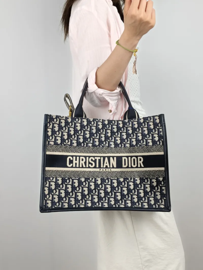 DIOR Shoulder Bag Book Tote Shoulder Strap Edition Blue Canvas · Calfskin Medium 36.5 × 16.5 × 28 cm — on-model view 1 of 3