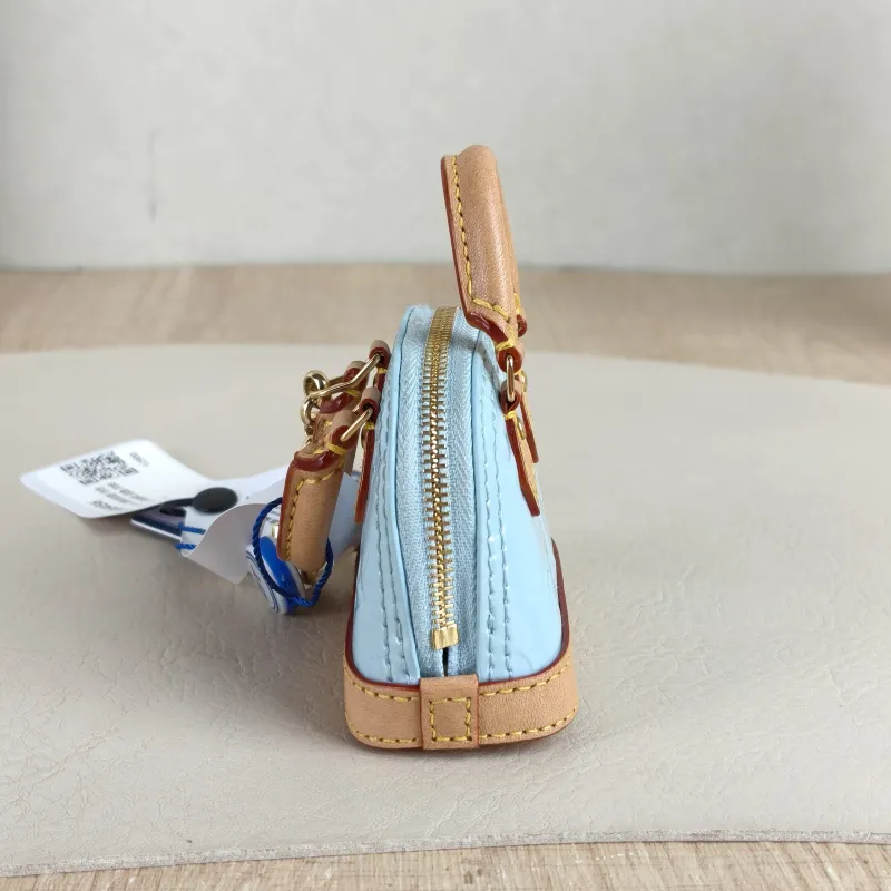Louis Vuitton Key Ring alma Key Ring Blue Patent Leather One Size 8 × 3.5 × 6 cm — detail view 6 of 6