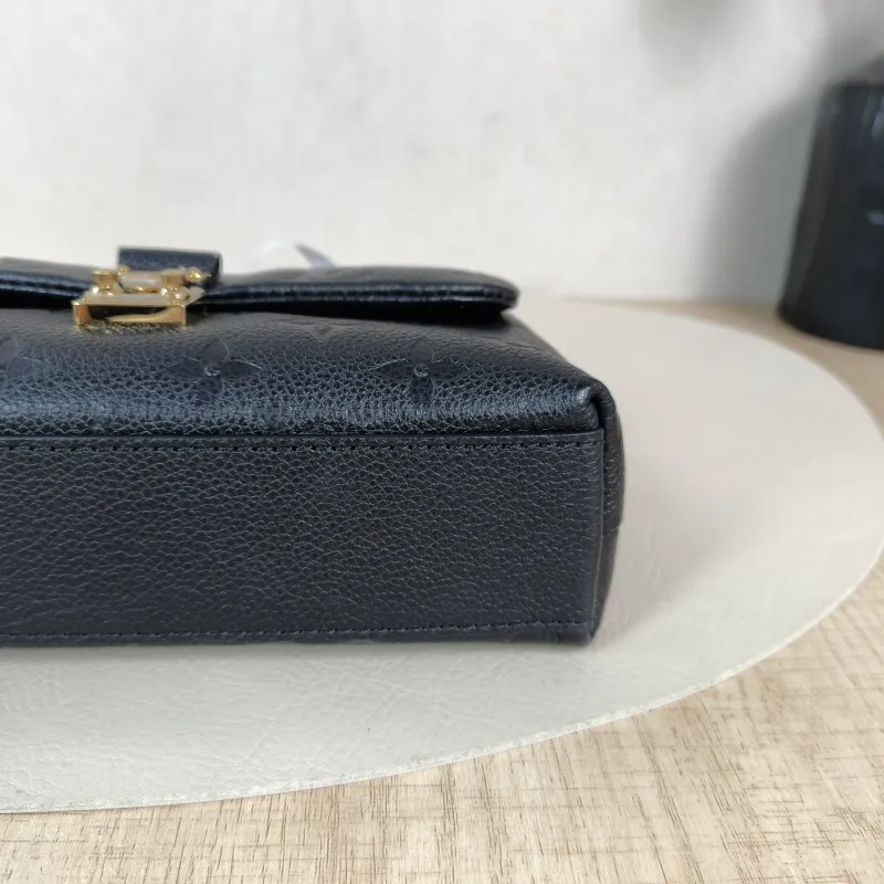 Louis Vuitton Crossbody Bag MADELEINE Black Monogram Empreinte Embossed Calfskin nano 21 × 6 × 12.5 cm — detail view 13 of 14