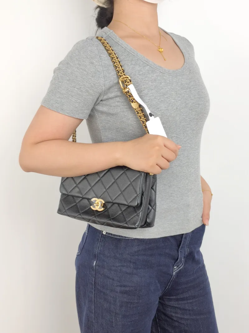 Chanel Crossbody Bag 23s Black Lambskin One Size 21 × 8 × 14 cm — on-model view 2 of 2