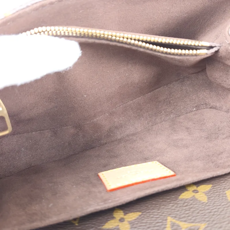 Louis Vuitton Crossbody Bag Pochette Métis East West Monogram PVC Small 21.5 × 6 × 13.5 cm — detail view 1 of 14