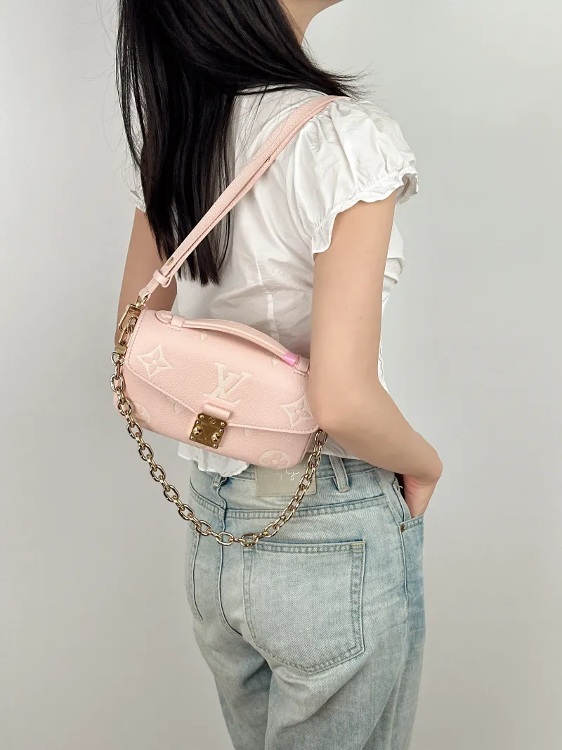 Louis Vuitton Crossbody Bag Pochette Métis East West Monogram Empreinte Embossed Calfskin Small 21.5 × 6 × 13.5 cm — on-model view 4 of 4