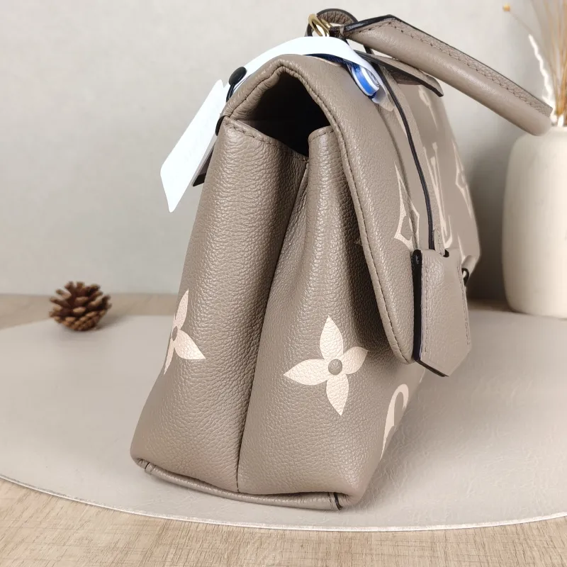 Louis Vuitton Crossbody Bag MADELEINE Empreinte Embossed Calfskin Medium30 × 11 × 19.5 cm — detail view 12 of 14