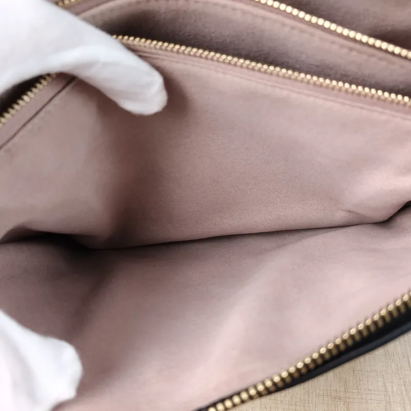 Louis Vuitton Crossbody Bag Coussin Black Lambskin Small 26 × 12 × 20 cm — detail view 8 of 11