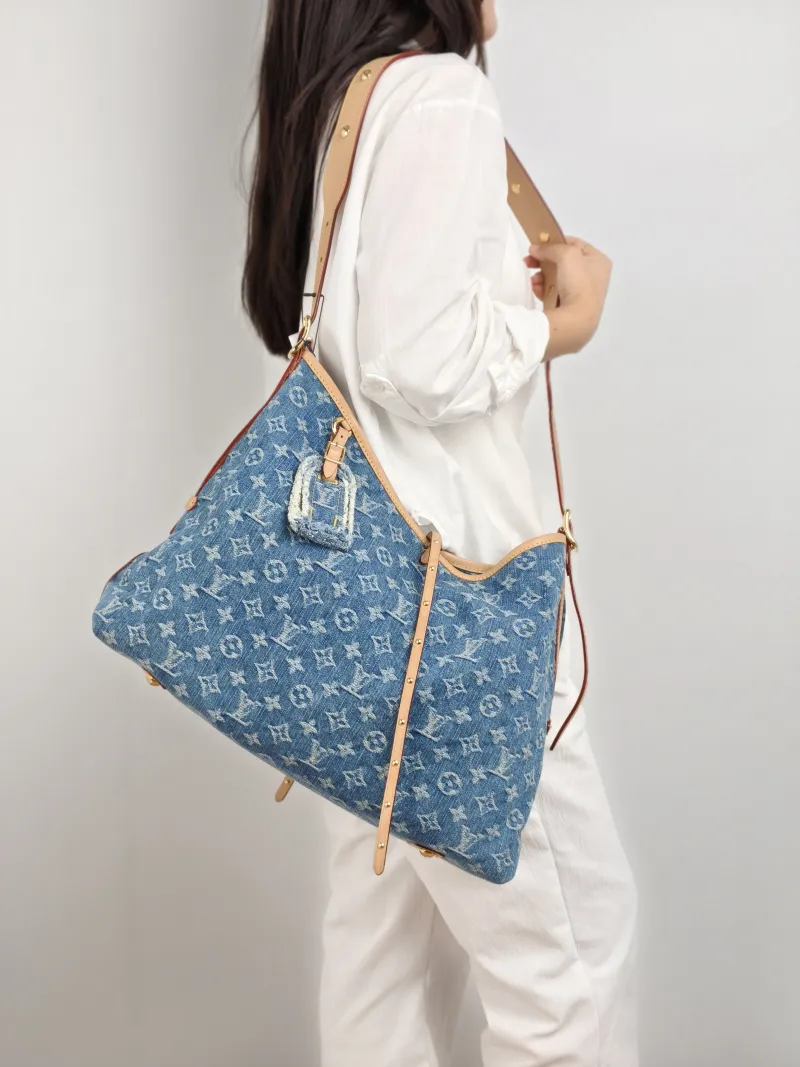 Louis Vuitton Crossbody Bag Carryall Blue Medium 39 × 15 × 30 cm — on-model view 2 of 2