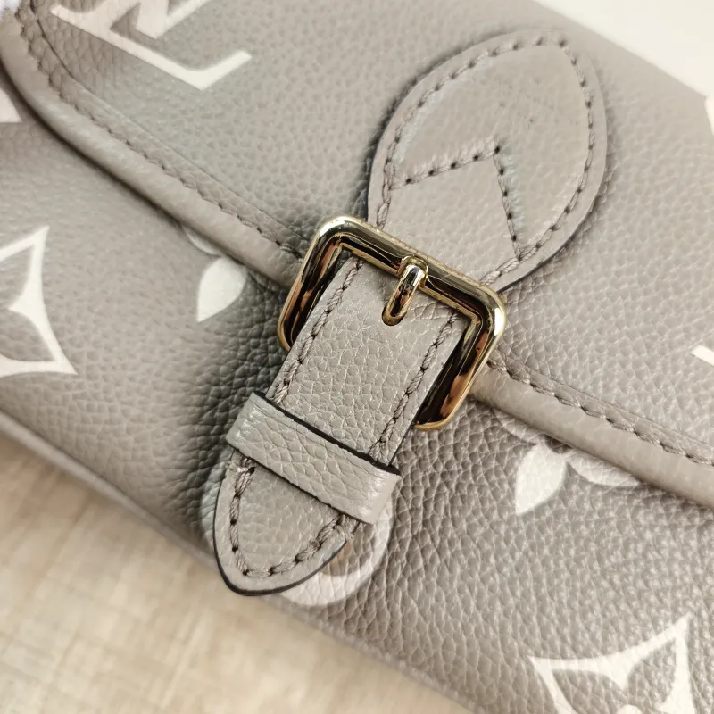 Louis Vuitton Crossbody Bag Diane Baguette Bag Empreinte Embossed Calfskin nano 19 × 6 × 10.5 cm — detail view 7 of 12