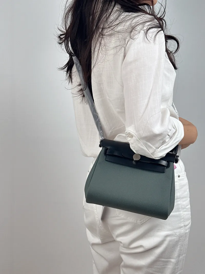 Hermès Crossbody Bag Herbag Zip 20 Calfskin，Canvas Mini 20.5 × 7 × 16.5 cm K — on-model view 2 of 2