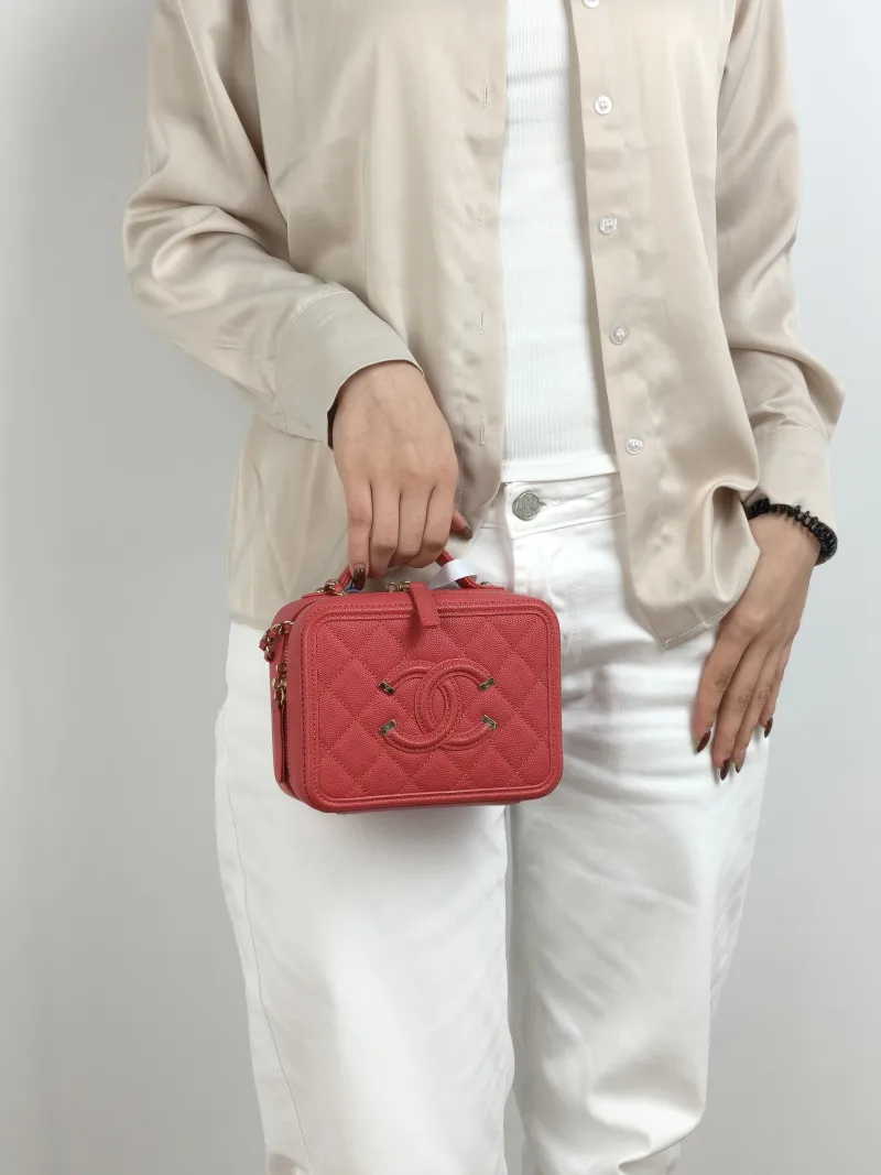 Chanel Crossbody Bag CC Filigree Vanity Cosmetic Bag Pink Grained Calfskin Small 17 × 7 × 13 cm 29 — on-model view 2 of 3