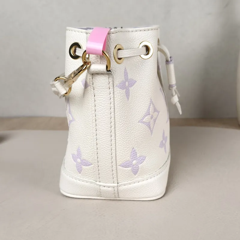 Louis Vuitton Crossbody Bag NANO NOÉ Bucket Bag Nano White · Monogram Empreinte Embossed Calfskin nano 13 × 10 × 16 cm — detail view 8 of 9