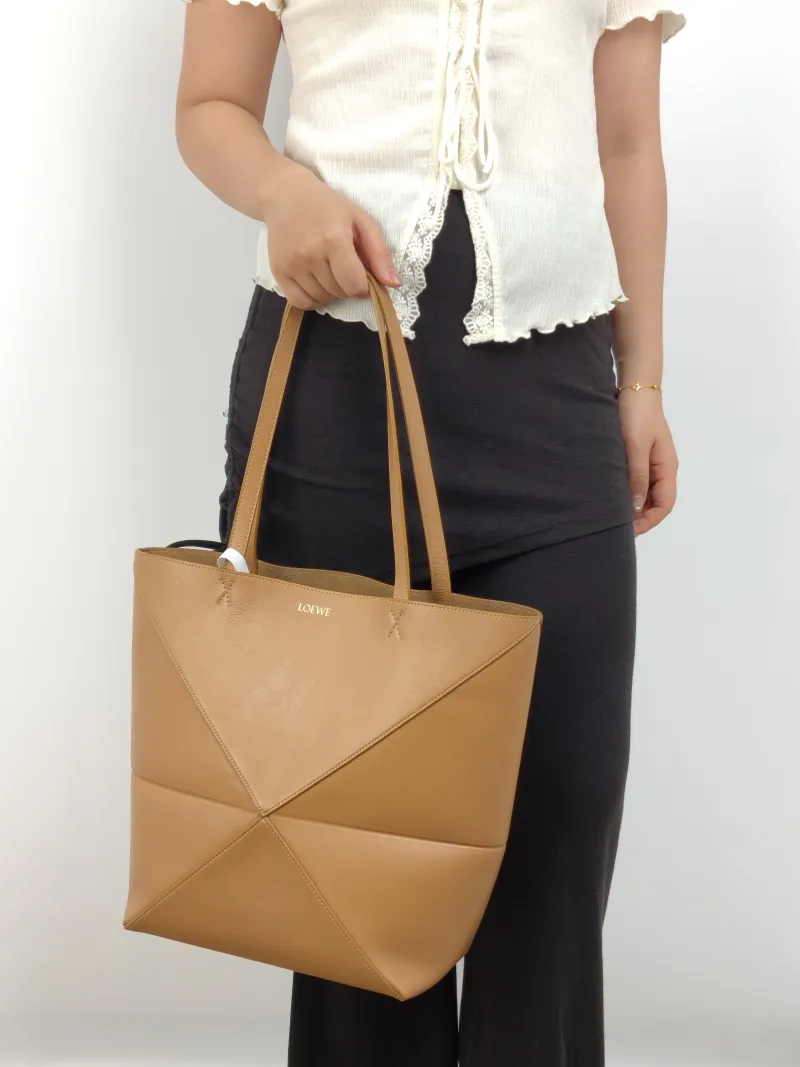 LOEWE Shoulder Bag Puzzle Fold Shopping Tote Calfskin Medium 25.5 × 14.5 × 31.5 cm — on-model view 1 of 2
