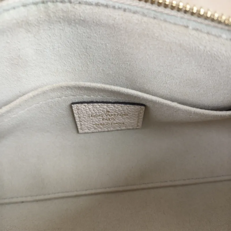 Louis Vuitton Crossbody Bag Papillon · Monogram Empreinte Embossed Calfskin BB 20 × 10 × 10 cm — detail view 9 of 9
