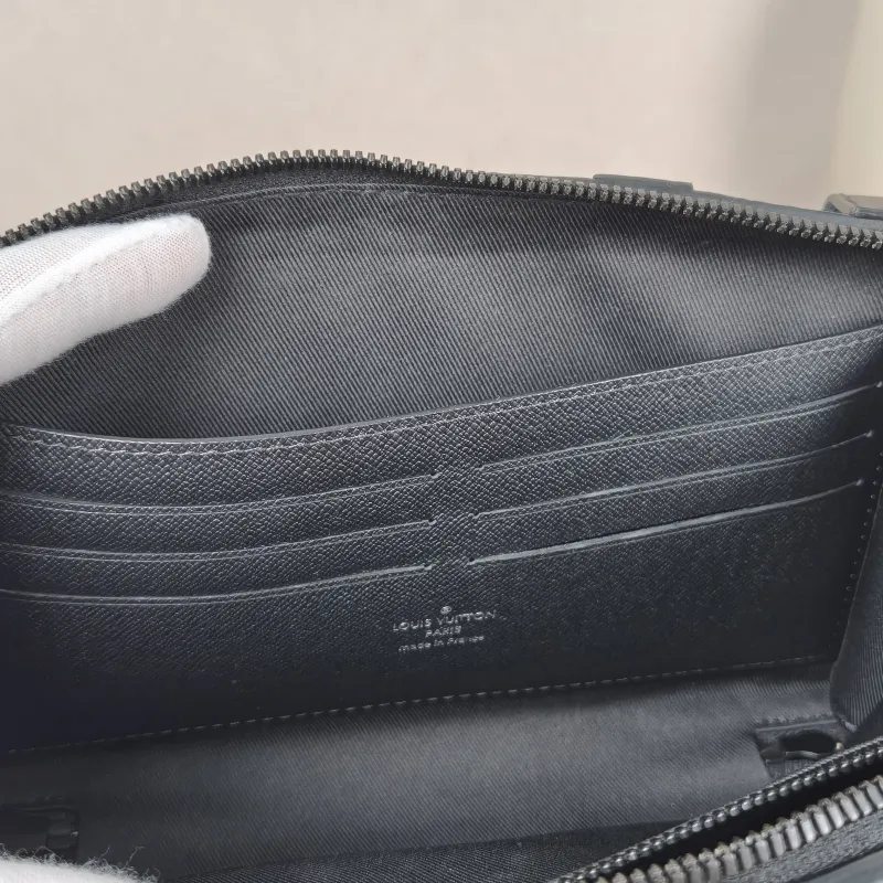 Louis Vuitton TRUNK WALLETHET Box Monogrampvc · Microchip Edition · Shoulder Strap Dust Bag · 22.5 × 5 × 14 cm — on-model view 8 of 10
