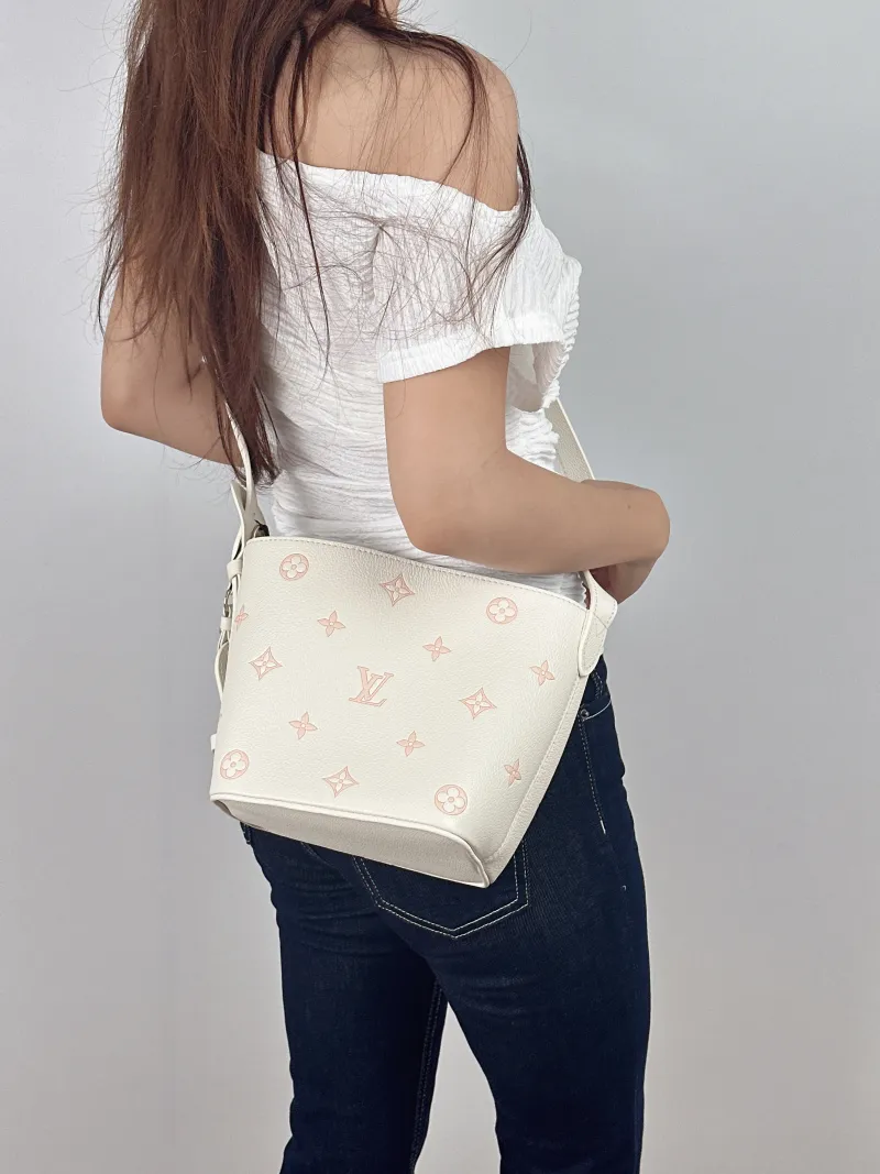 Louis Vuitton Top Handle Bag ALL IN BB White · Pink Calfskin BB16 × 12 × 18 cm — on-model view 1 of 2