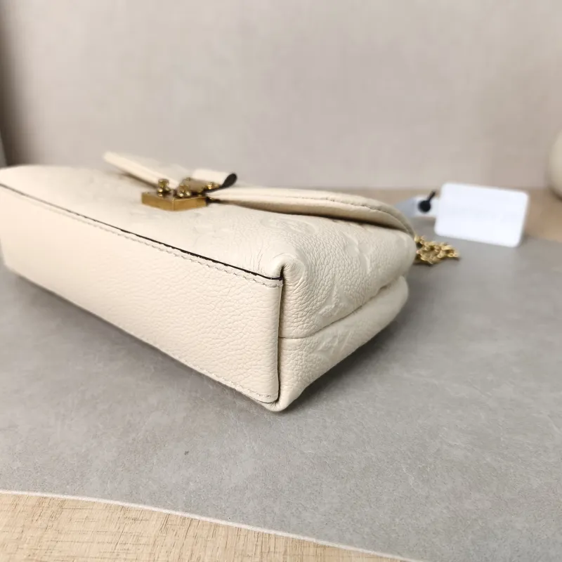Louis Vuitton Crossbody Bag MADELEINE White Empreinte Embossed Calfskin nano 21 × 6 × 12.5 cm — detail view 5 of 11