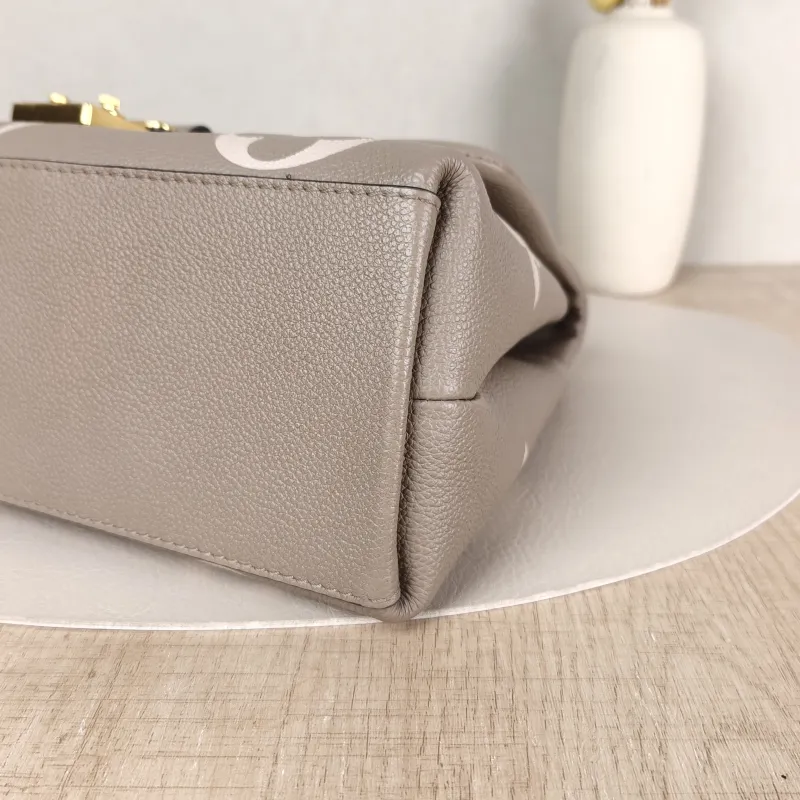 Louis Vuitton Crossbody Bag MADELEINE Empreinte Embossed Calfskin Medium30 × 11 × 19.5 cm — detail view 14 of 14