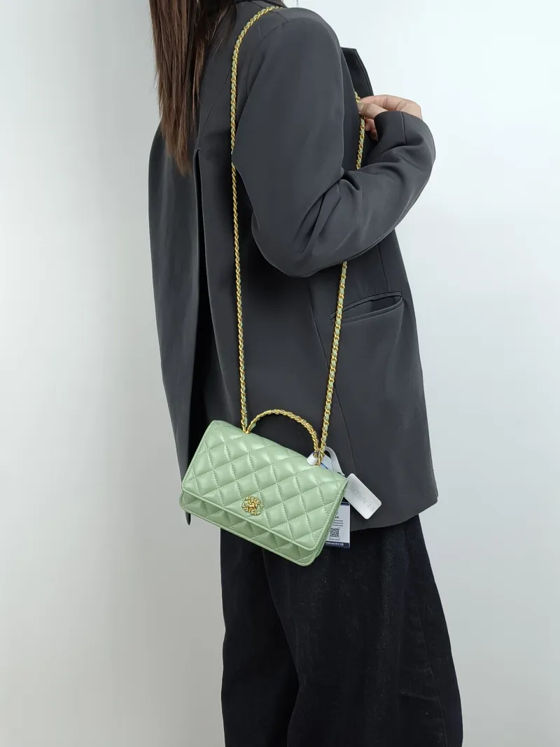 Chanel Crossbody Bag Edition woc Green Lambskin Mini 19.2 × 3.5 × 12.3 cm — on-model view 3 of 3