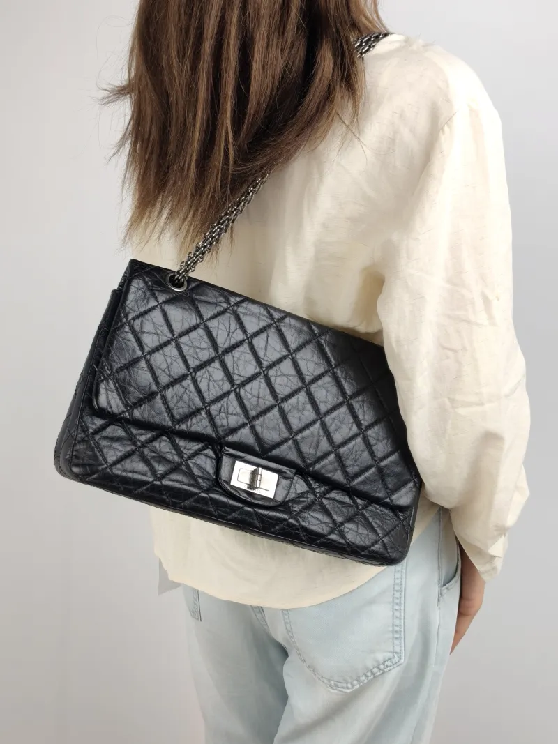 Chanel Shoulder Bag 2.55 Black Calfskin Large 31.5 × 10 × 20 cm 13 — on-model view 1 of 2