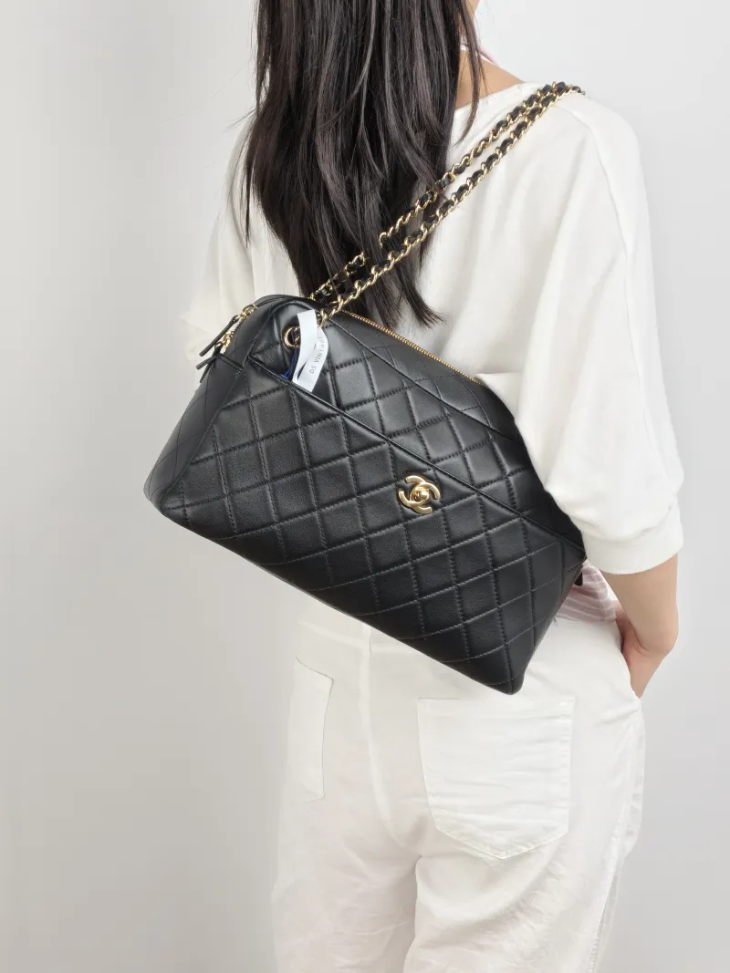 Chanel Crossbody Bag Bowling Bag Black Lambskin One Size 31 × 9 × 19 cm — on-model view 1 of 3