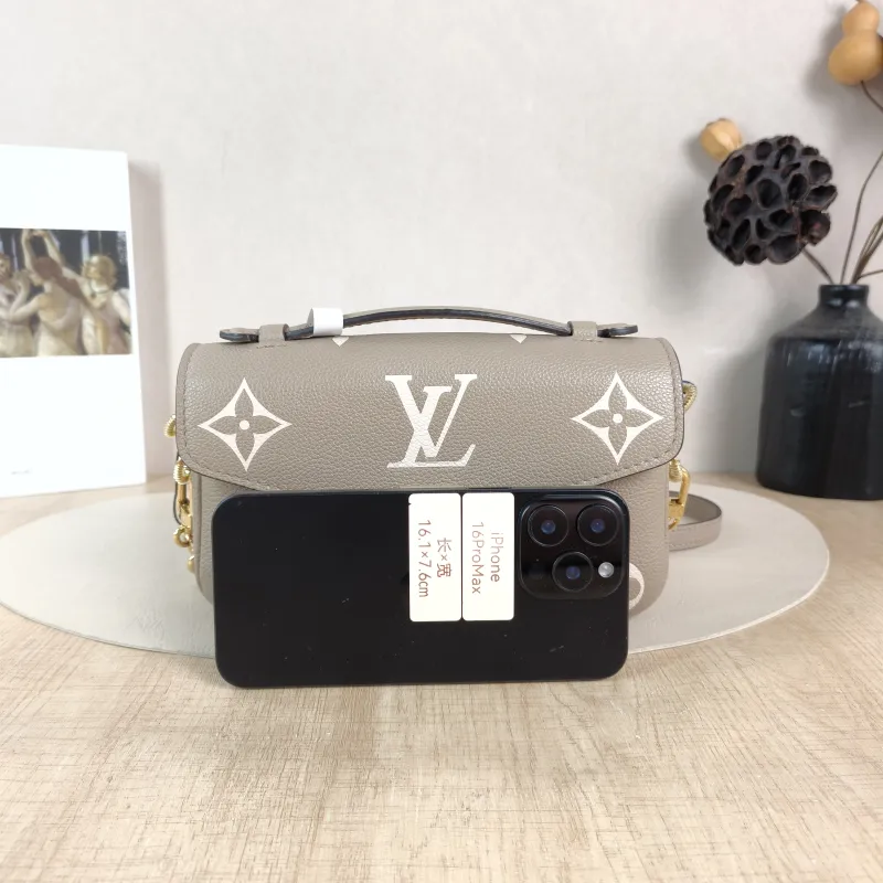Louis Vuitton Crossbody Bag Pochette Métis East West Monogram Empreinte Embossed Calfskin Small 21.5 × 6 × 13.5 cm — cover view 5 of 6