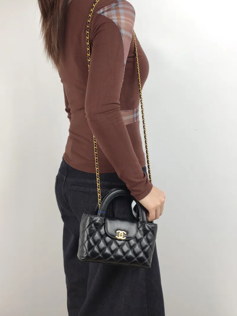 Chanel Shoulder Bag Kelly Black Waxed Leather Small 19 × 7 × 13 cm — on-model view 3 of 3