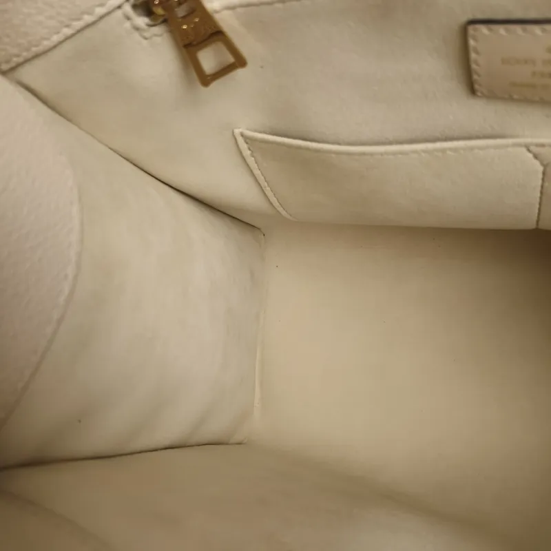 Louis Vuitton Shoulder Bag Onthego Medium White Monogram Empreinte Embossed Calfskin Medium 35 × 14 × 27 cm — detail view 2 of 10