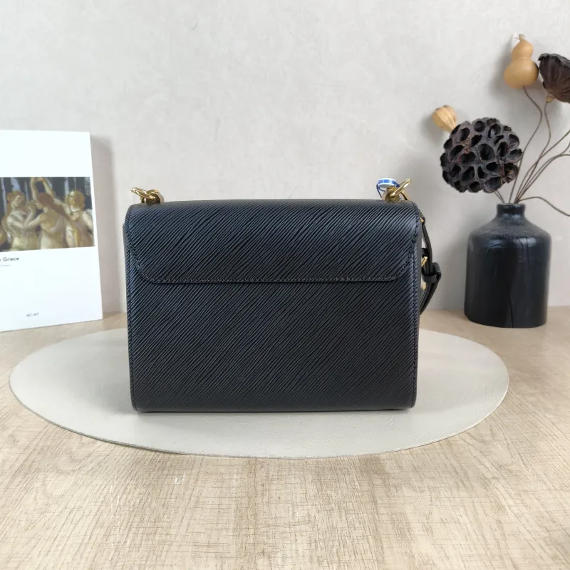 Louis Vuitton Crossbody Bag Twist Black Epi Embossed Calfskin Medium 23 × 9.5 × 17 cm — cover view 5 of 6