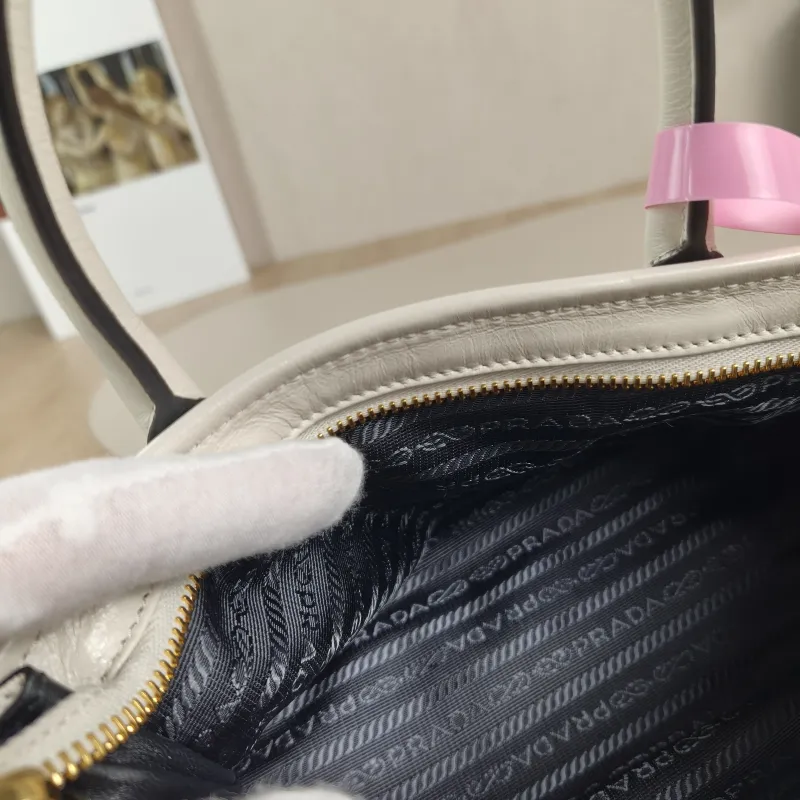 PRADA Top Handle Bag Bonnie Soft Lux White Waxed Leather Mini 23.5 × 9 × 12 cm — detail view 8 of 14